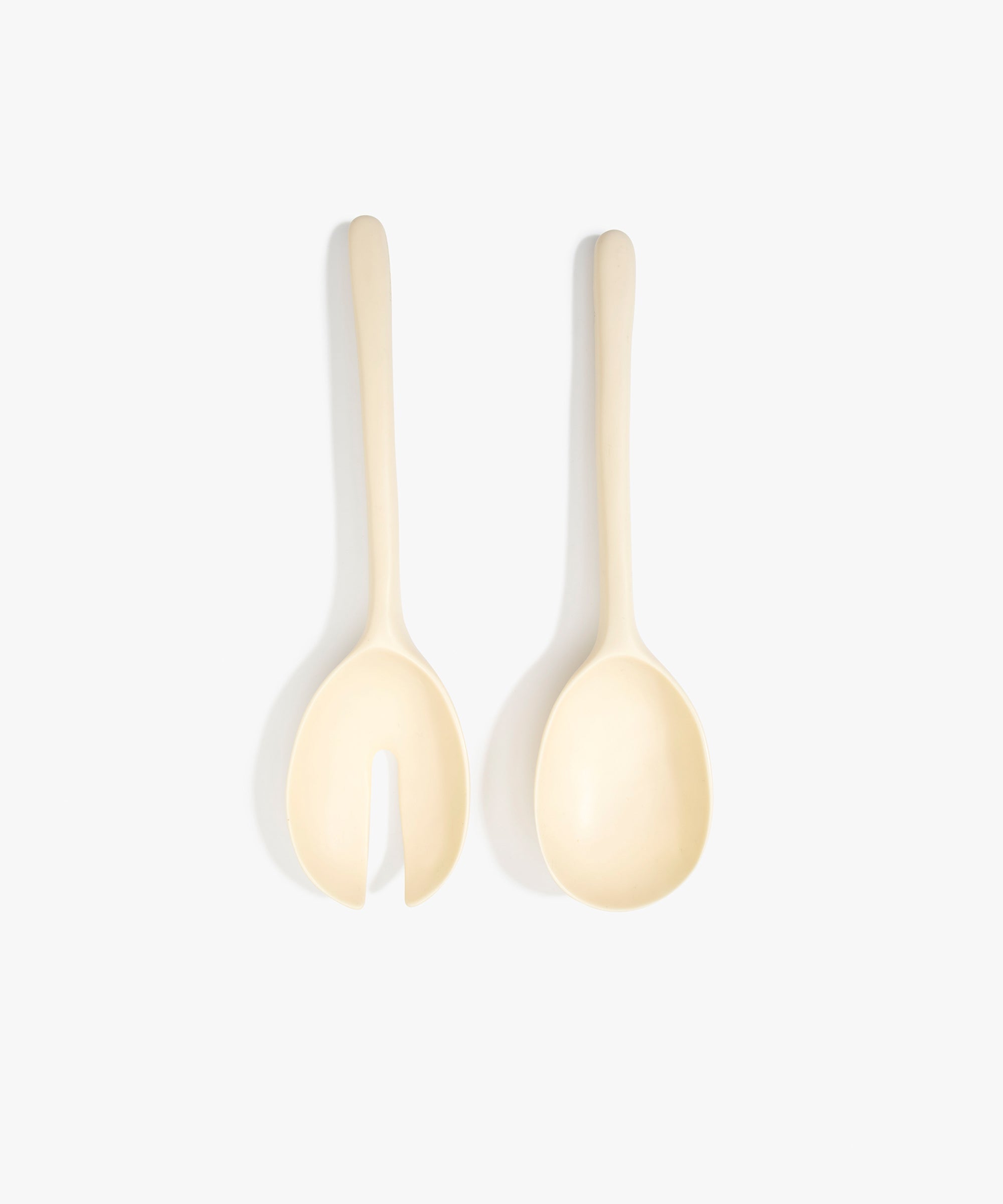 Dinosaur Designs Long Stone Servers in Cream color resin