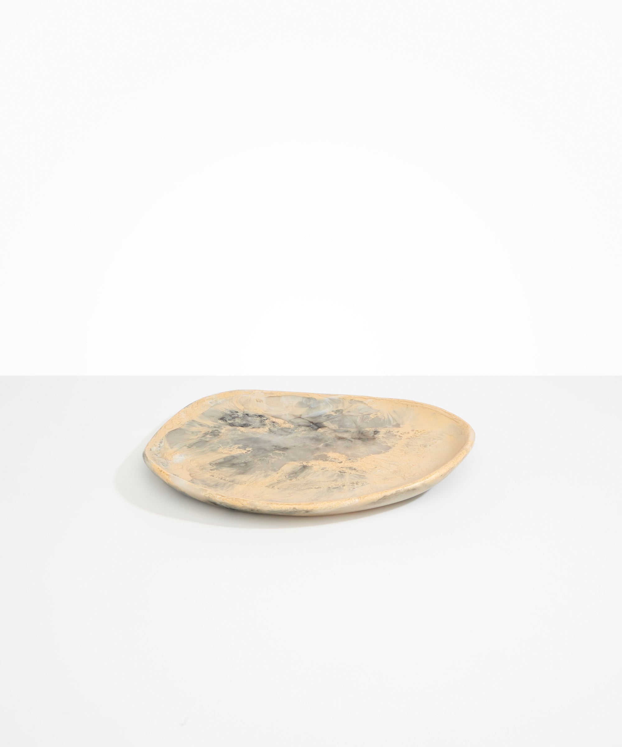 Dinosaur Designs Pebble Plate in Sandy Pearl Colour resin.