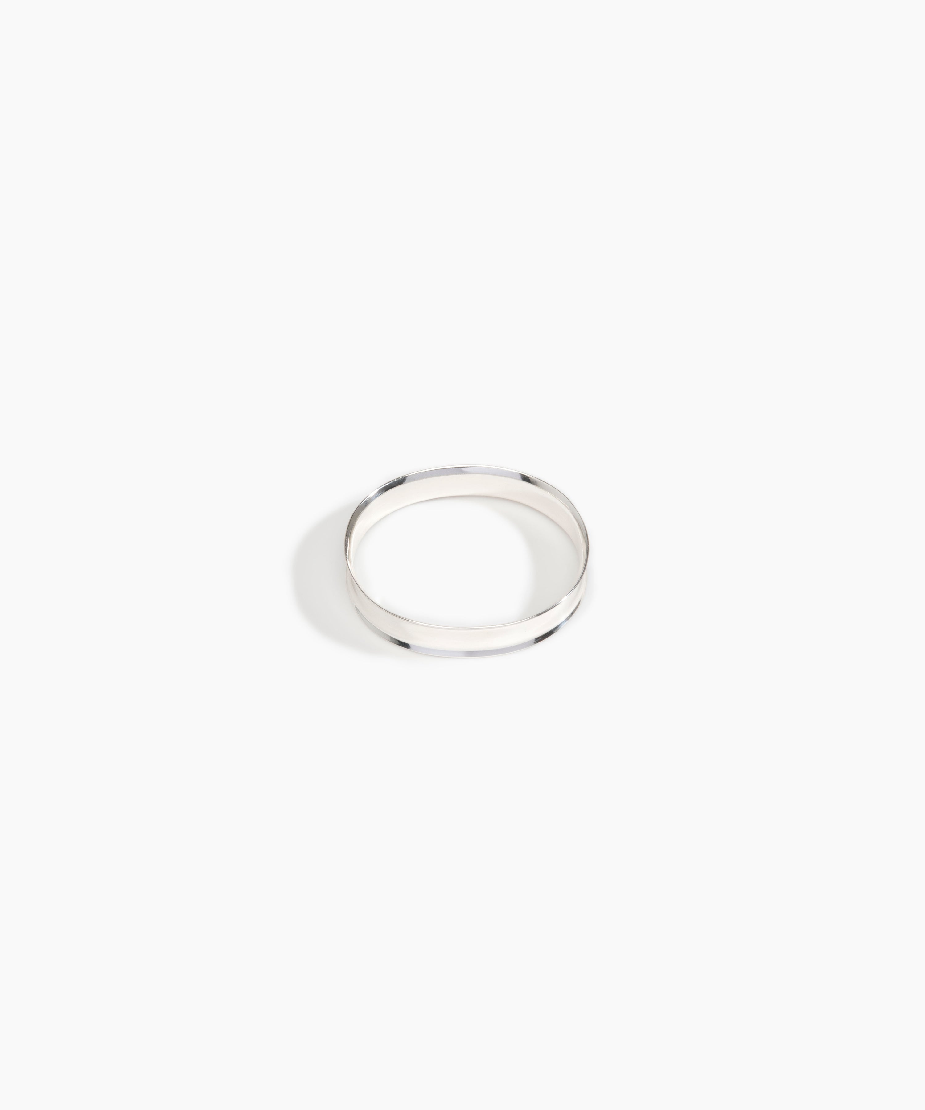 LO Collections x ALEX AND TRAHANAS Narrow Voyage Bangle in Silver-Plated Brass Material....