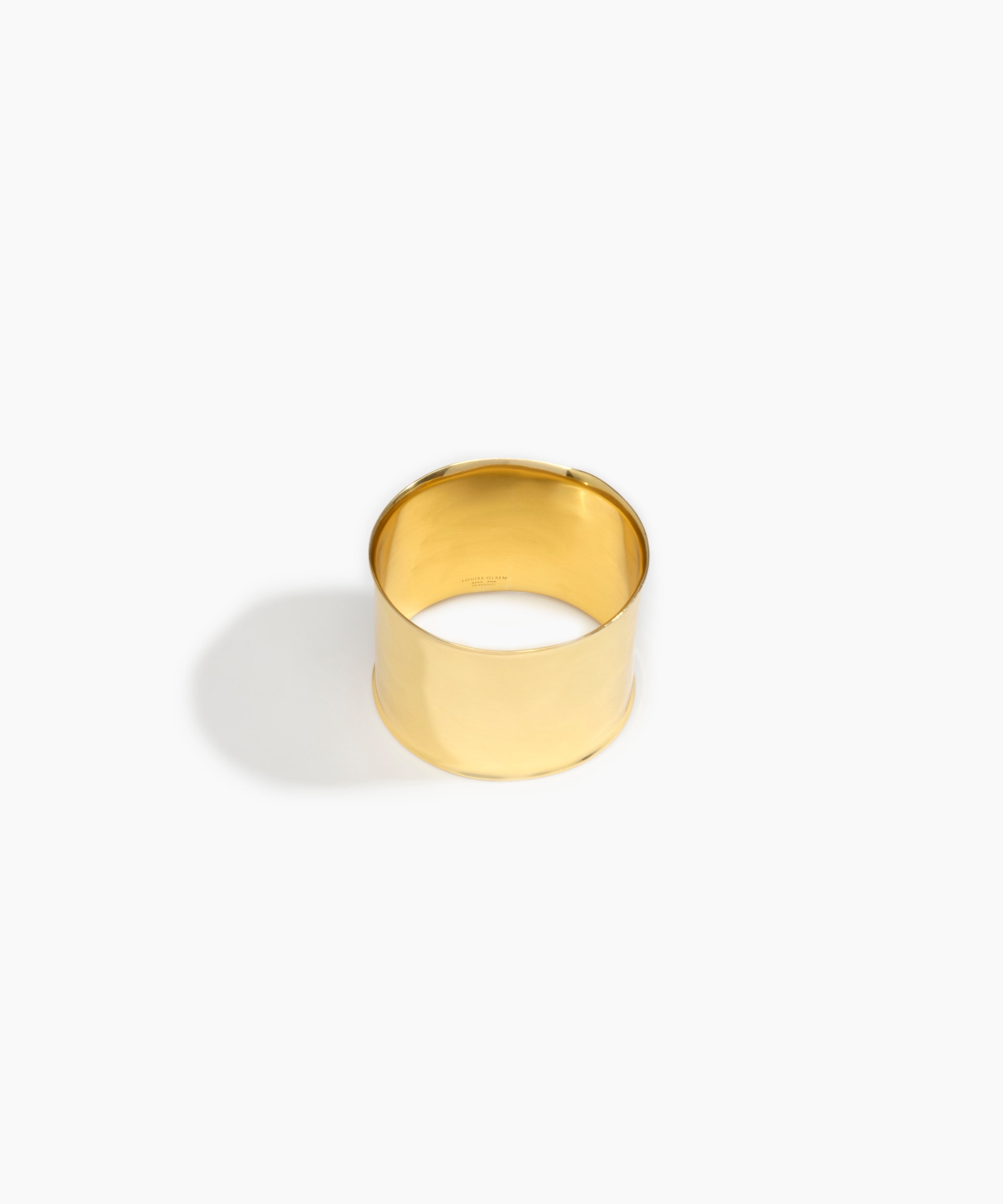 LO Collections x ALEX AND TRAHANAS Wide Voyage Bangle in Nano-Coated Brass Material....