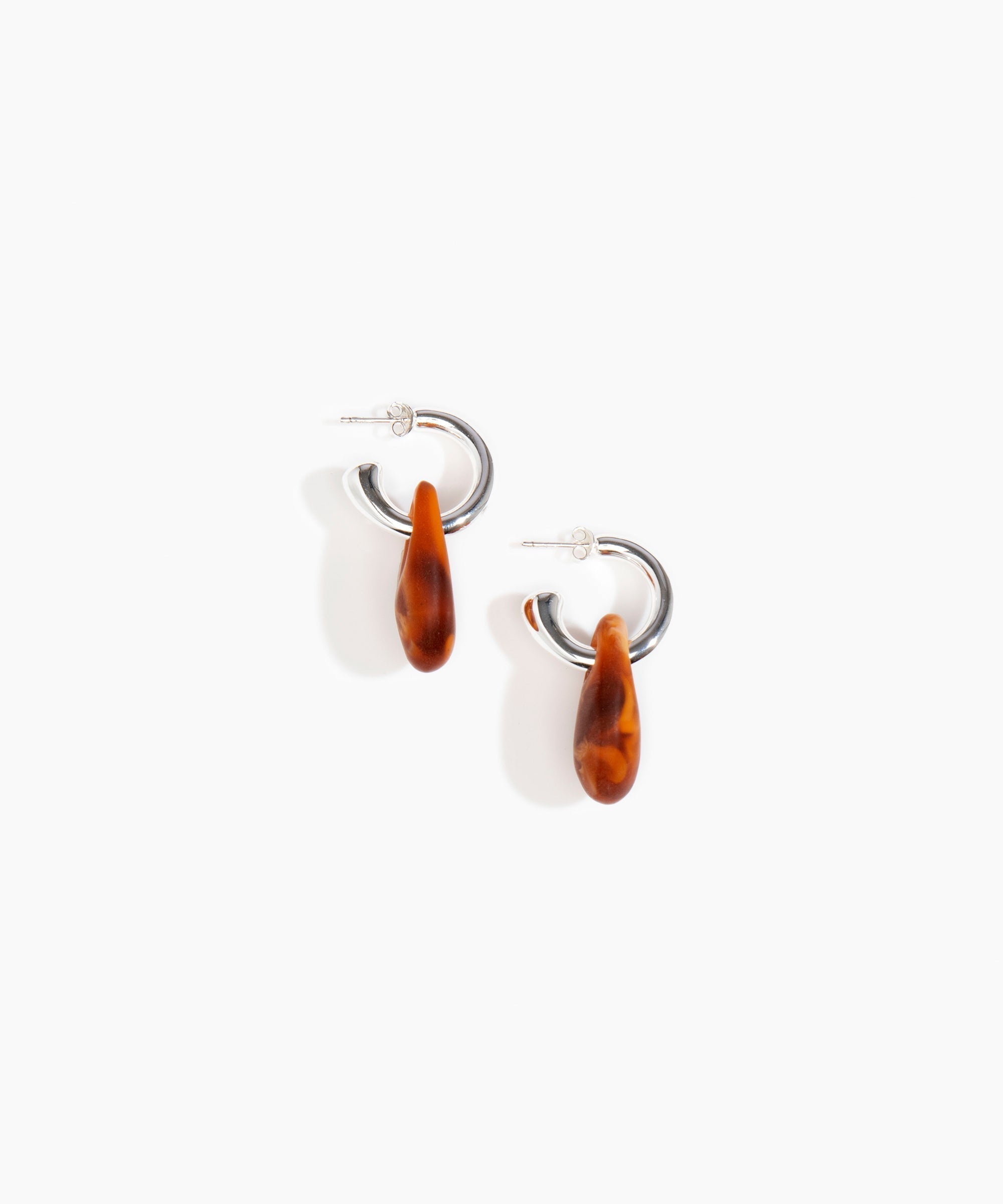 Dinosaur Designs Small Rock Hoop Earrings in Dark Horn Colour resin with Silver-Plated Brass Hoop Material.