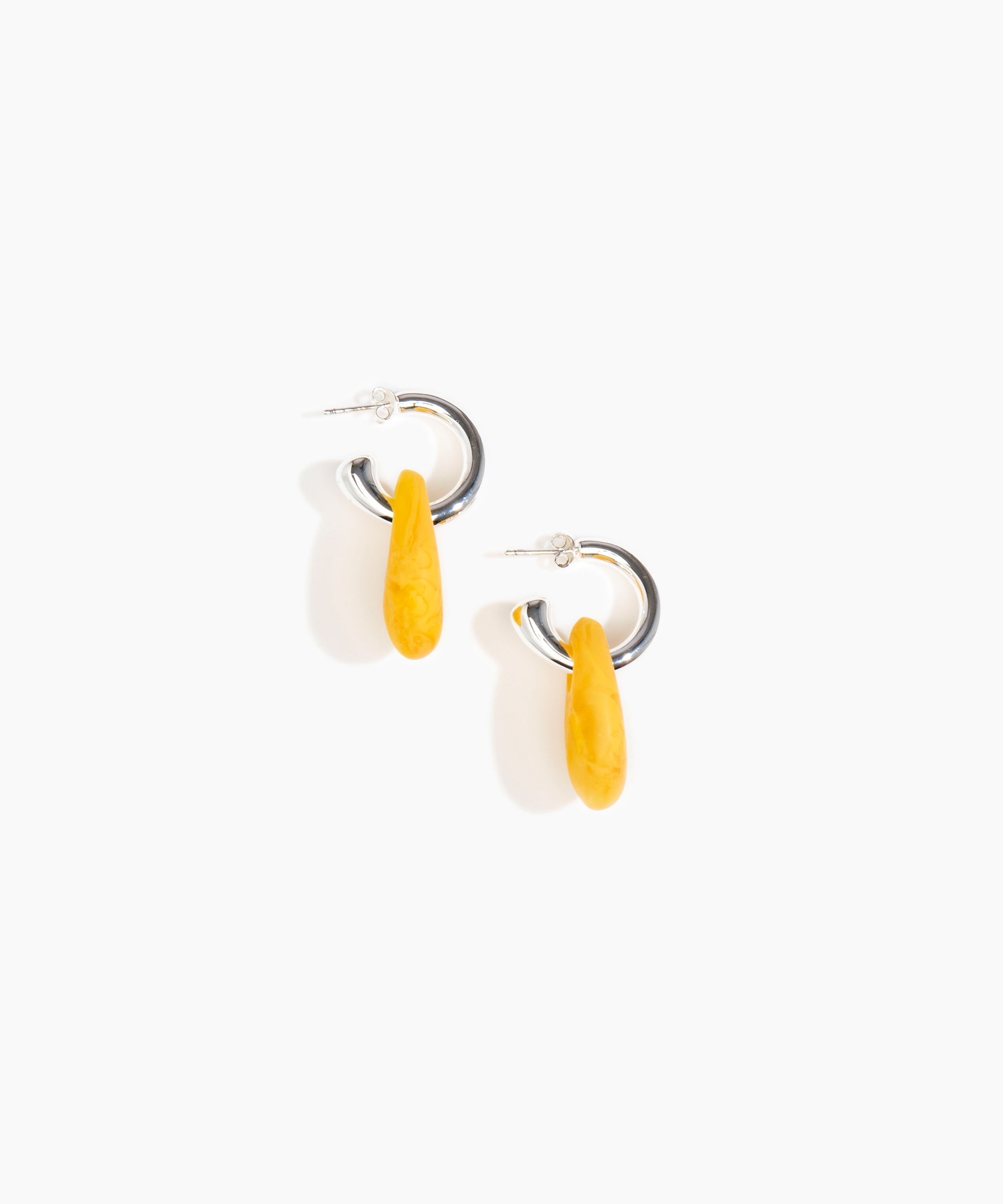 Dinosaur Designs Small Rock Hoop Earrings in Honeycomb Colour resin with Silver-Plated Brass Hoop Material.