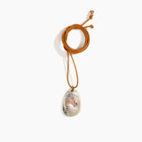 Dinosaur Designs River Rock Pendant on Leather in Sandy Pearl color resin