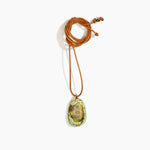 Dinosaur Designs River Rock Pendant on Leather in Malachite color resin