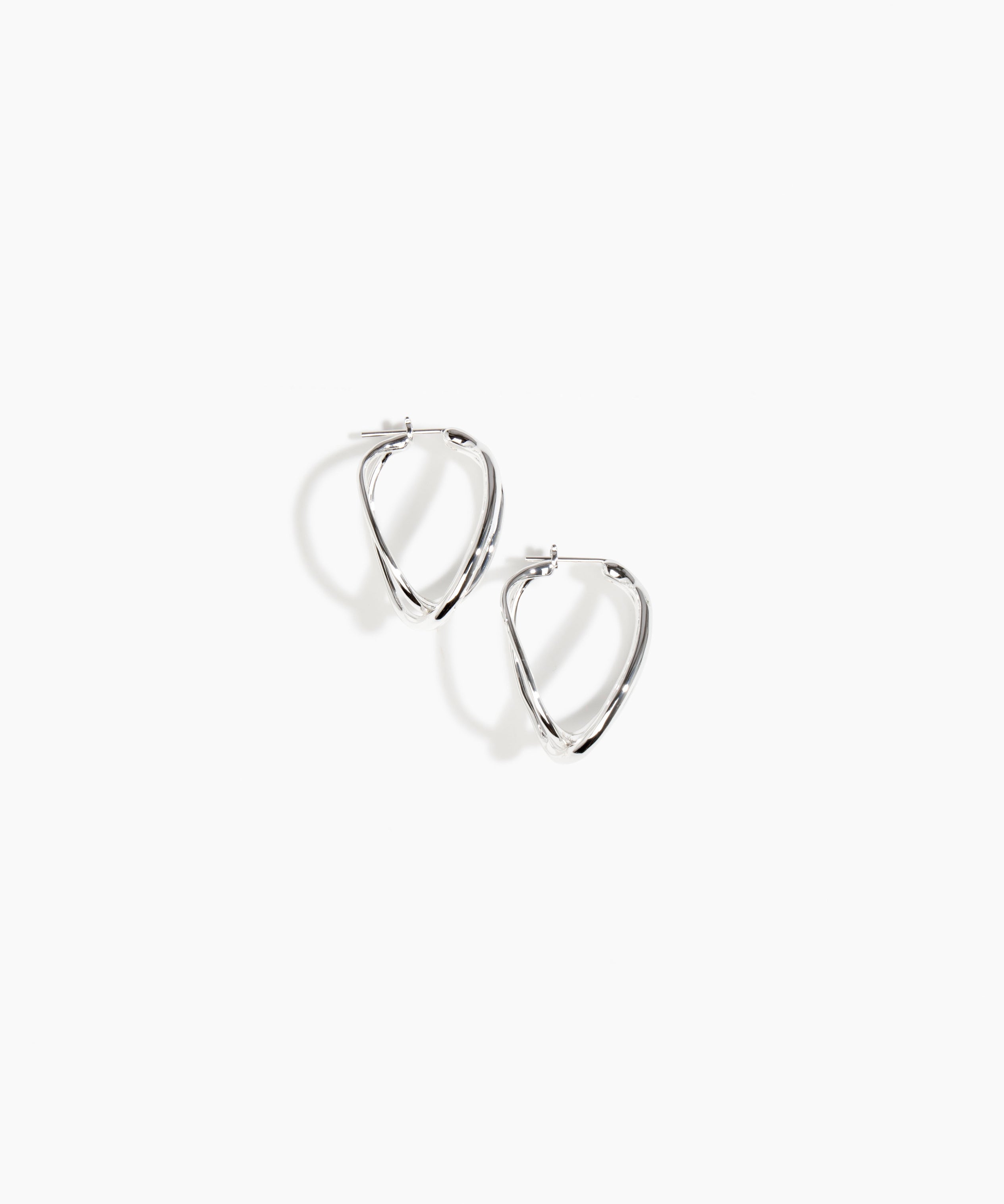Dinosaur Designs and Alex & Trahanas Medium Corda Earrings in Silver — polished silver-toned plated hoop earrings with interlinked twisted loop design