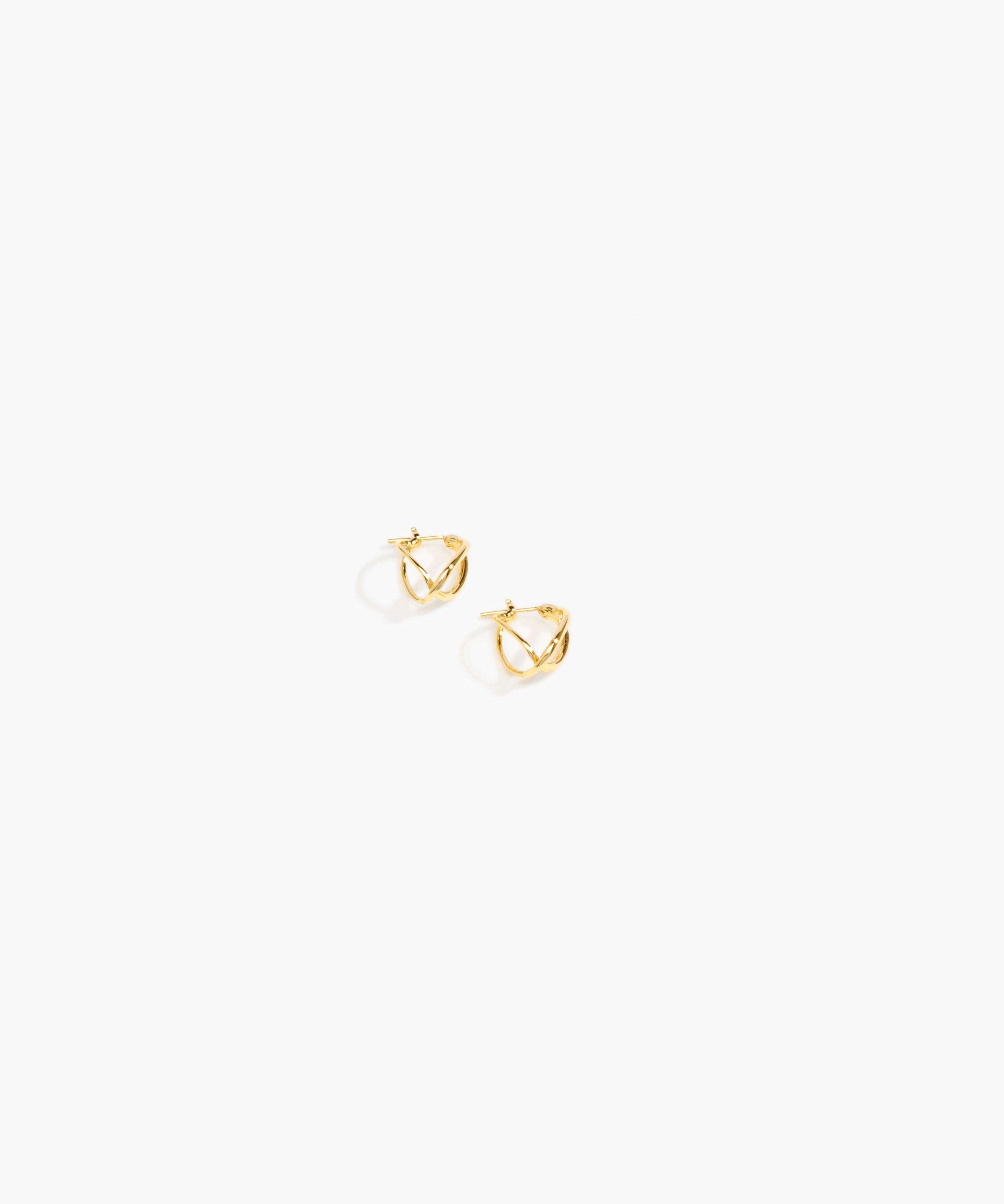 Dinosaur Designs and Alex & Trahanas Small Corda Earrings in Brass — polished gold-toned brass hoop earrings with interlinked twisted loop design