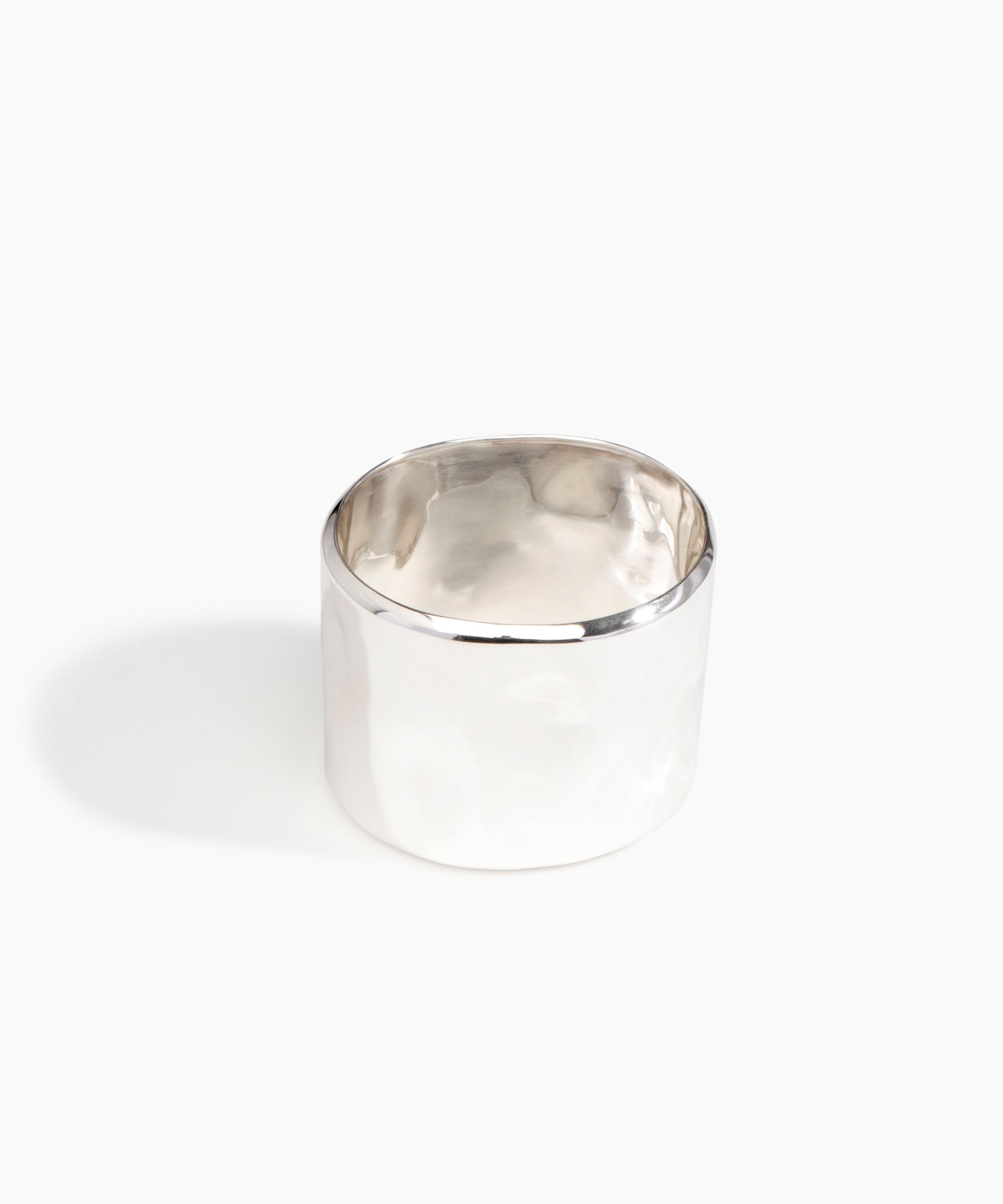 LO Collections Wide Dimpled Bangle in Silver-Plated Brass Material..