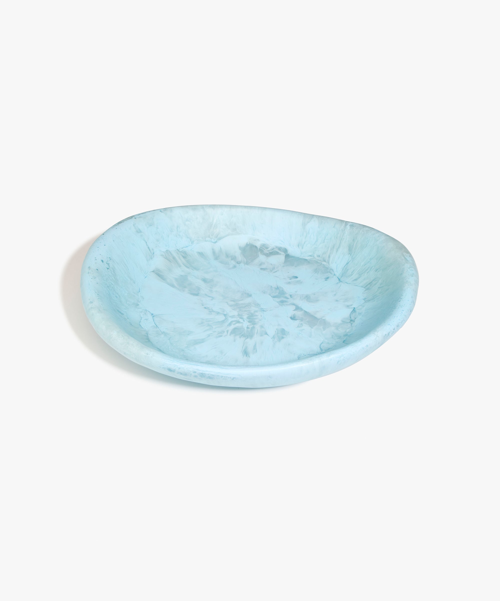 Dinosaur Designs Large Bones Bowl in Pool — handmade marbled blue resin shallow serving bowl with a rounded organic form...