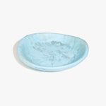 Dinosaur Designs Large Bones Bowl in Pool — handmade marbled blue resin shallow serving bowl with a rounded organic form..