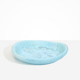 Dinosaur Designs Large Bones Bowl in Pool — handmade marbled blue resin shallow serving bowl with a rounded organic form...