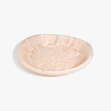 Dinosaur Designs Large Bones Bowl in Rose Swirl — handmade pink resin shallow serving bowl with a rounded organic form..