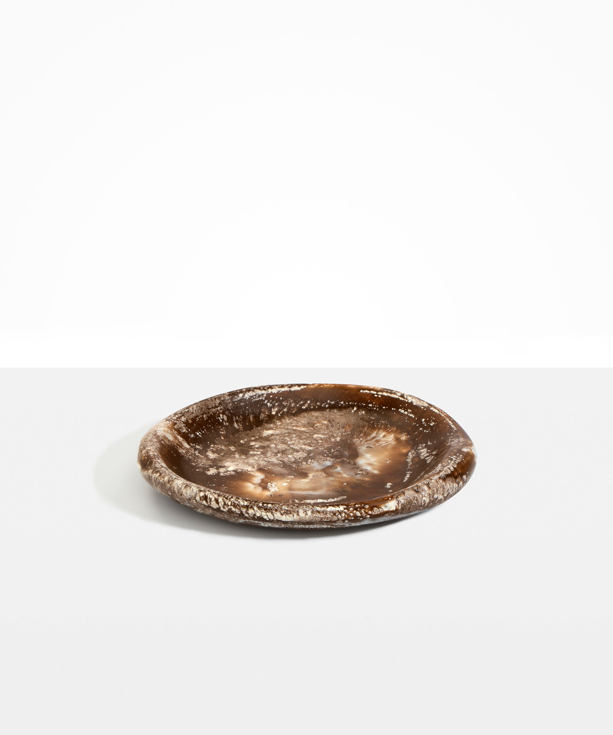 Dinosaur Designs Medium Bones Bowl in Cappuccino — mid sized handmade marbled brown and cream resin shallow serving bowl with a rounded organic form...
