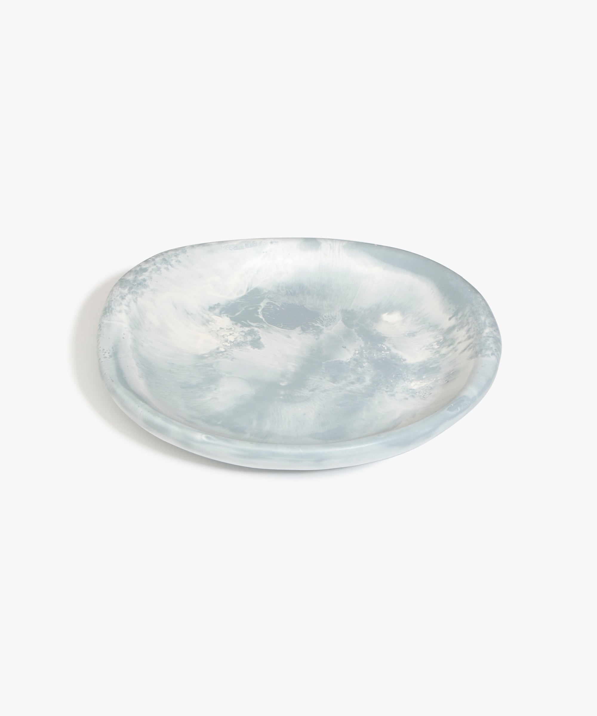 Dinosaur Designs Medium Bones Bowl in Cloud — mid sized handmade marbled cream and grey resin shallow serving bowl with a rounded organic form..