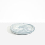 Dinosaur Designs Medium Bones Bowl in Cloud — mid sized handmade marbled cream and grey resin shallow serving bowl with a rounded organic form..