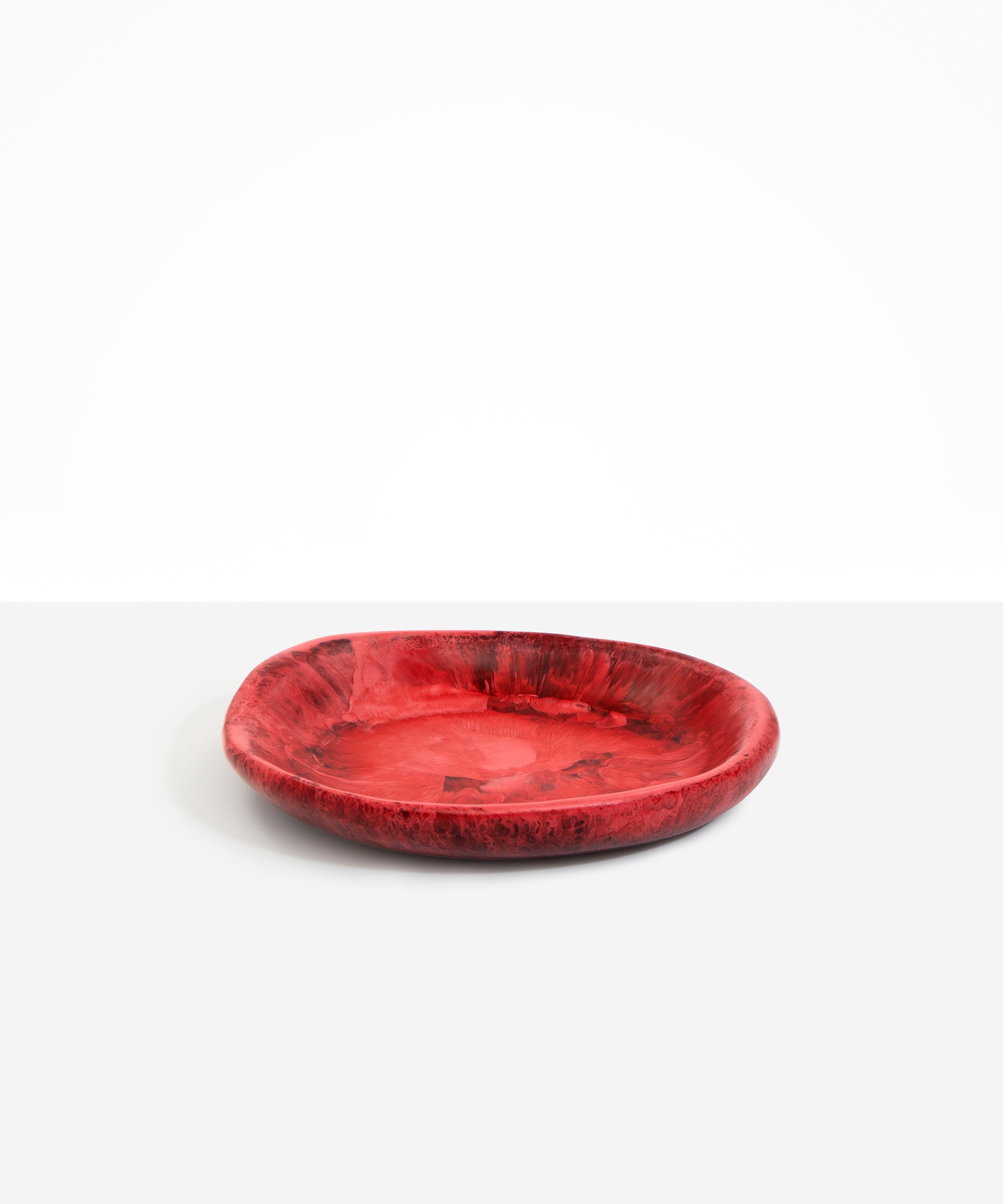Dinosaur Designs Medium Bones Bowl in Cranberry — mid sized handmade red resin shallow serving bowl with a rounded organic form