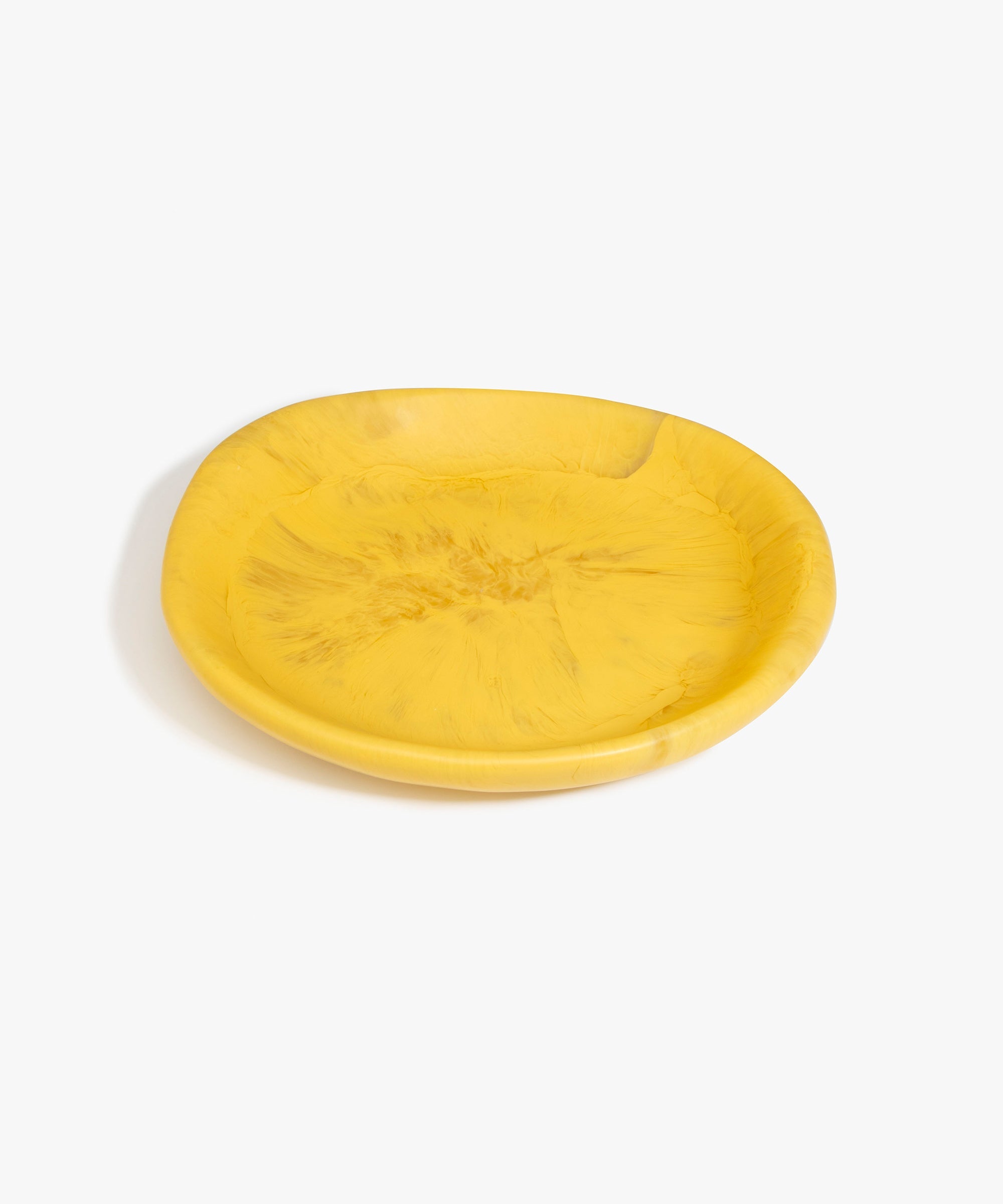 Dinosaur Designs Medium Bones Bowl in Pollen — mid sized handmade marbled yellow resin shallow serving bowl with a rounded organic form..