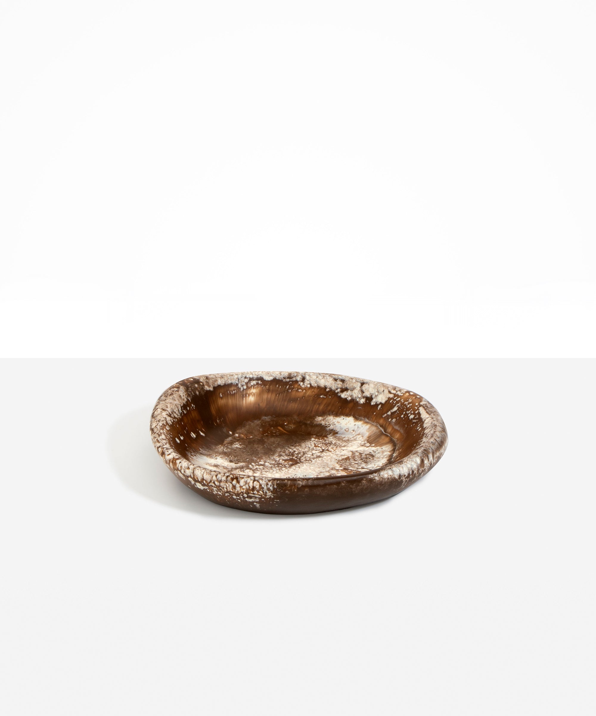 Dinosaur Designs Small Bones Bowl in Cappuccino — small handmade marbled brown and cream resin shallow serving bowl with a rounded organic form...