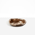 Dinosaur Designs Small Bones Bowl in Cappuccino — small handmade marbled brown and cream resin shallow serving bowl with a rounded organic form..