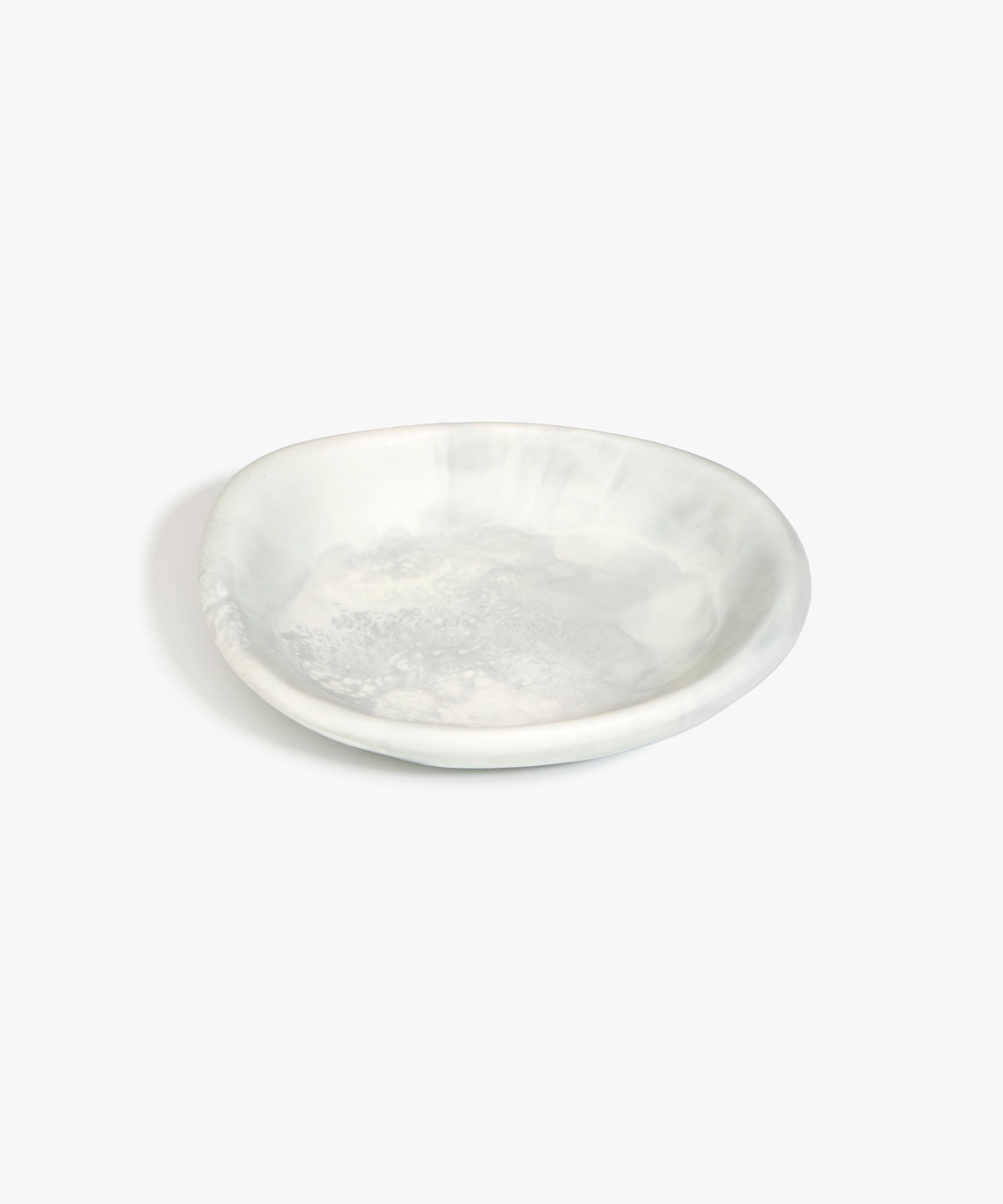 Dinosaur Designs Small Bones Bowl in Cloud — small handmade marbled grey and cream resin shallow serving bowl with a rounded organic form..