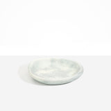 Dinosaur Designs Small Bones Bowl in Cloud — small handmade marbled grey and cream resin shallow serving bowl with a rounded organic form..