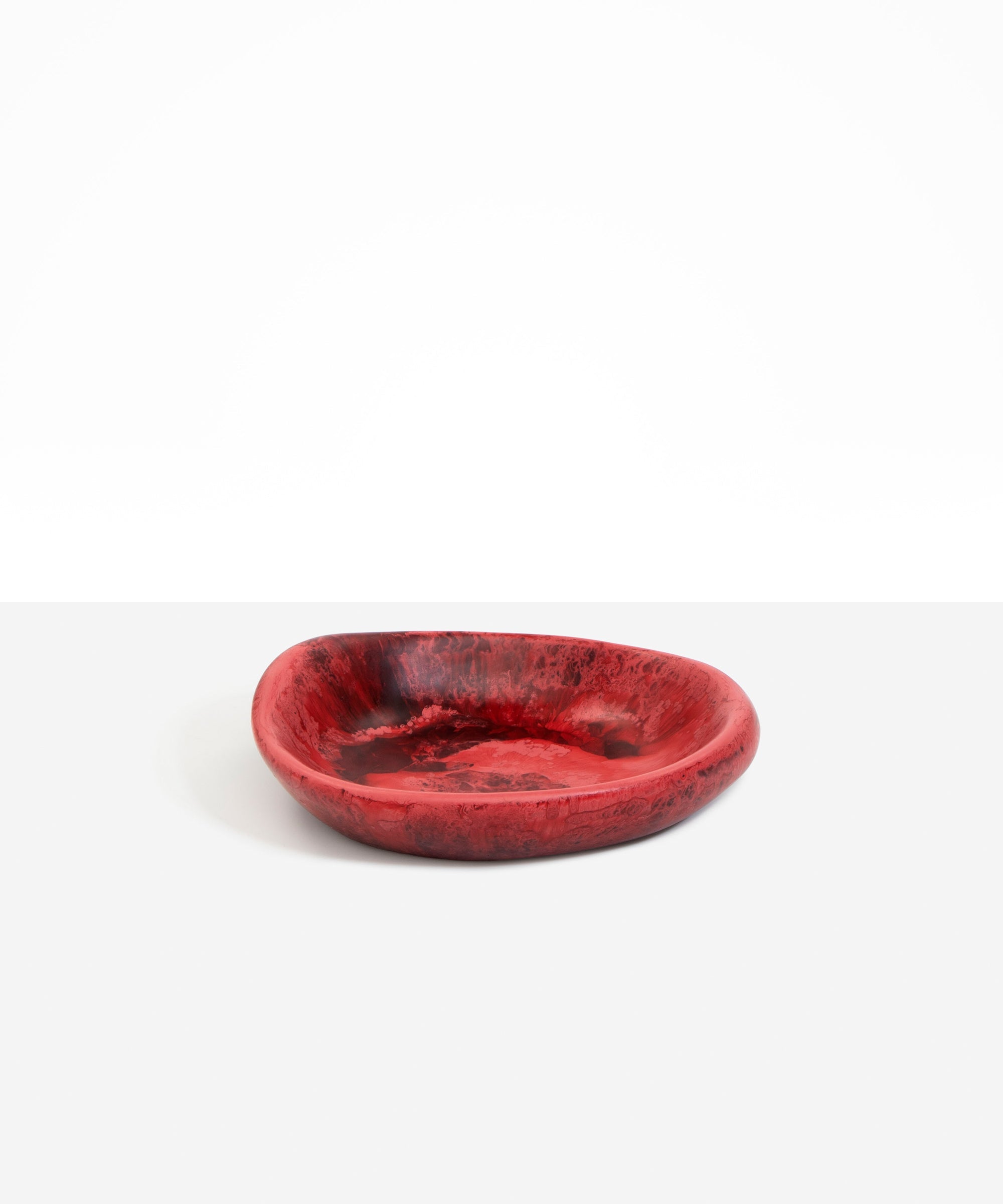 Dinosaur Designs Small Bones Bowl in Cranberry — small handmade marbled red resin shallow serving bowl with a rounded organic form