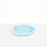 Dinosaur Designs Small Bones Bowl in Pool — small handmade marbled blue resin shallow serving bowl with a rounded organic form...