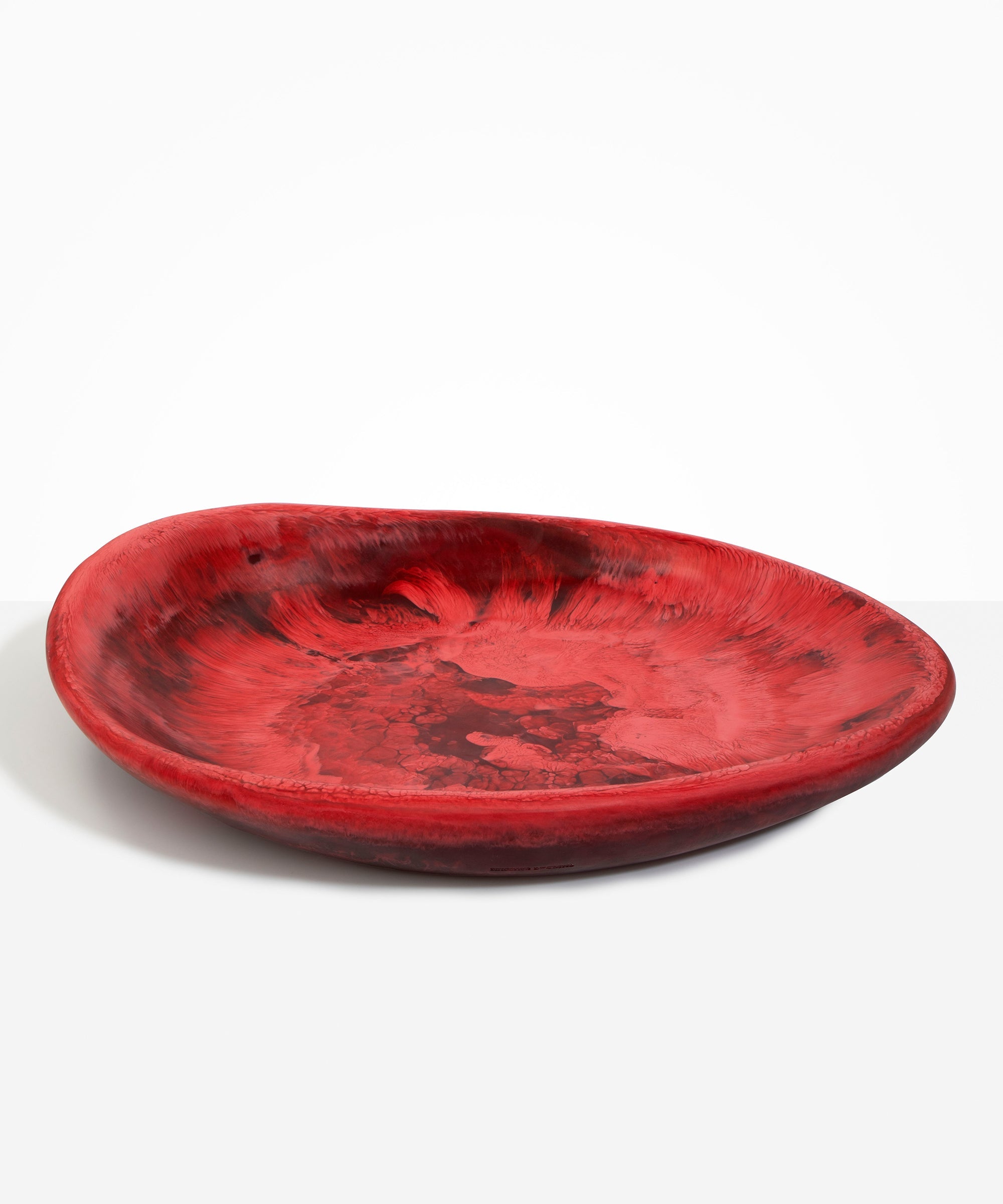 Dinosaur Designs Extra Large Bones Bowl in Cranberry —  handmade marbled red resin shallow decorative bowl with a rounded organic form