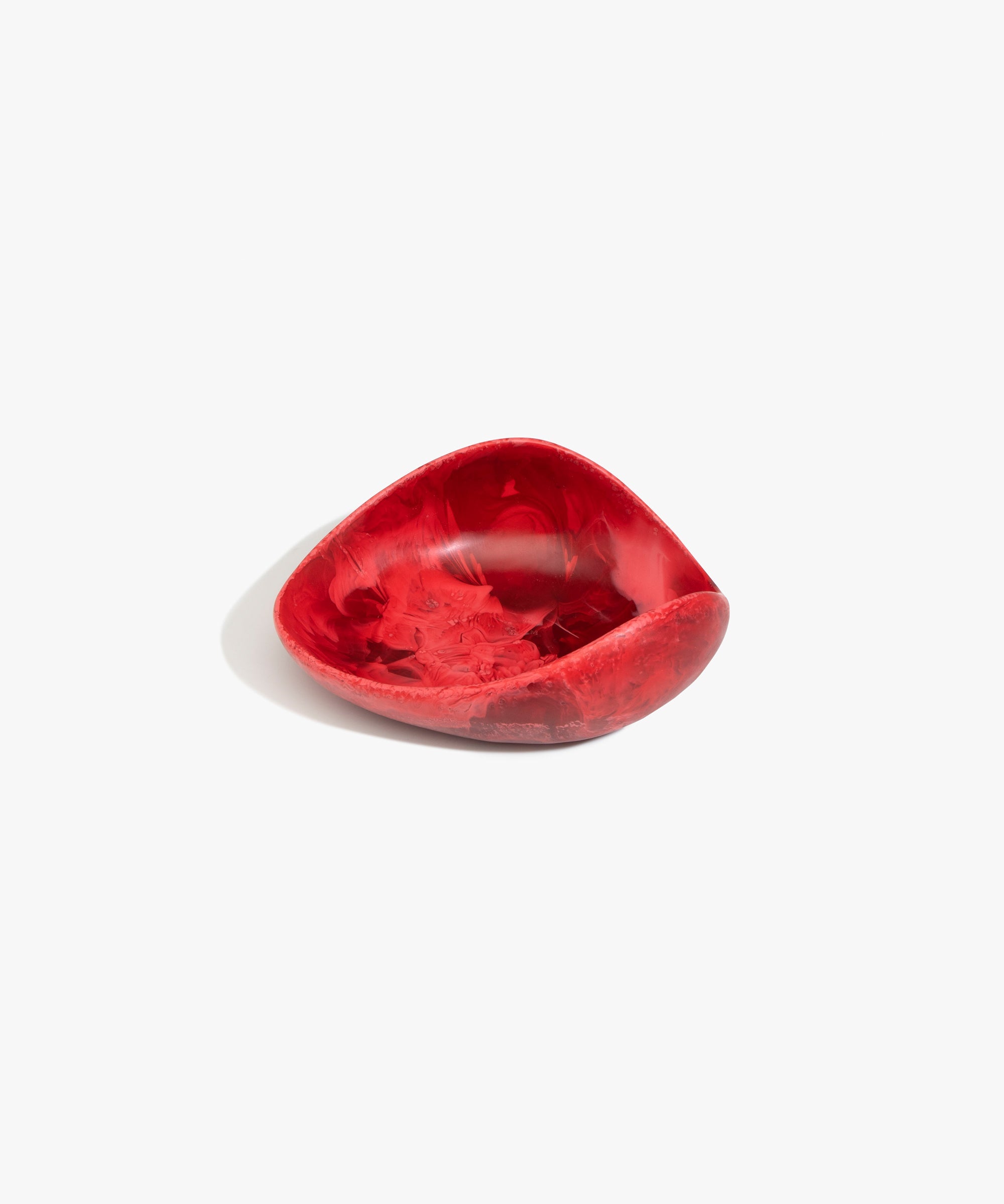 Dinosaur Designs Small Leaf Bowl in Cranberry — handcrafted marbled red resin bowl with curved organic form