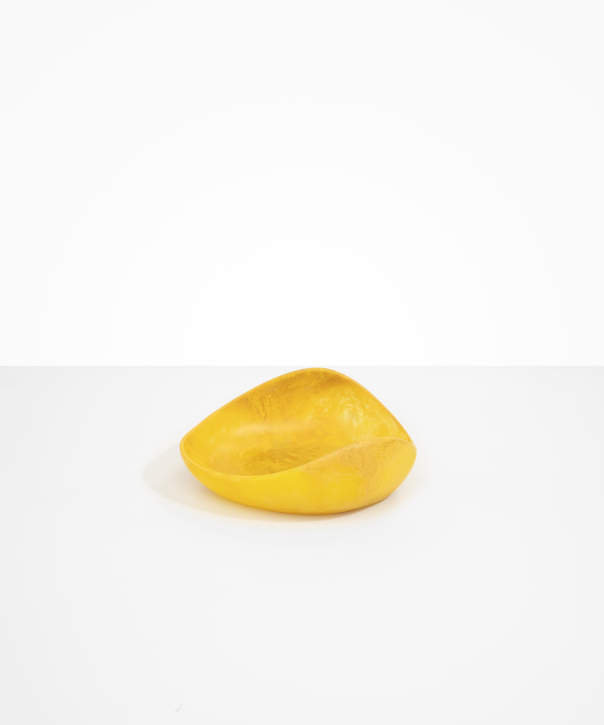 Dinosaur Designs Small Leaf Bowl in Honeycomb — handcrafted marbled yellow resin bowl with curved organic form