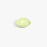 Dinosaur Designs Petal Dessert Bowl in Pistachio — handcrafted marbled pastel green resin bowl with curved form and pinched organic rim