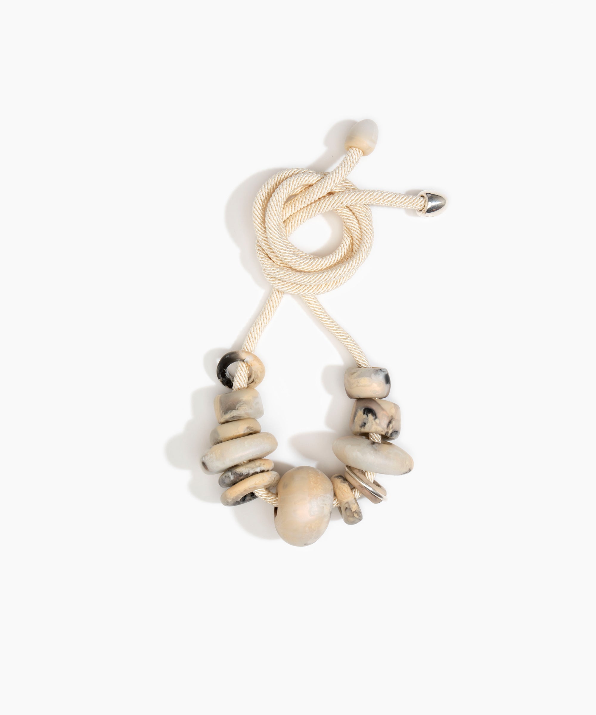 Dinosaur Designs Drift Choker Necklaces in Sandy Pearl color resin with Silver-Plated Brass Material