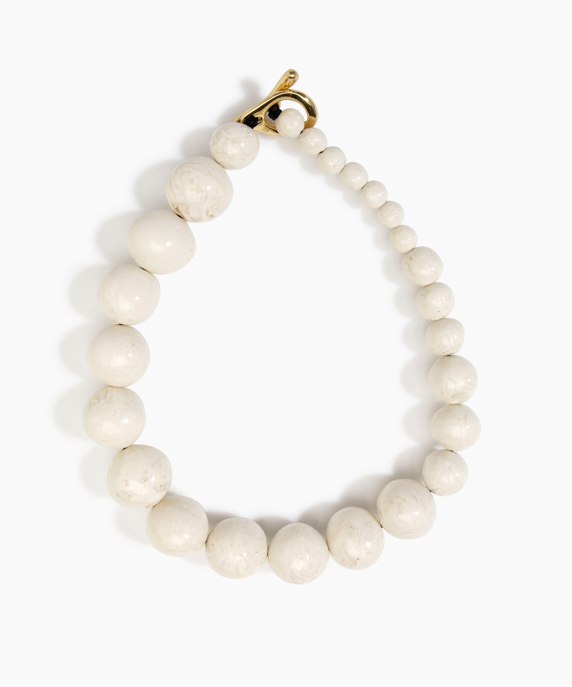 Dinosaur Designs Polished Organic Ball Choker in Chalk Swirl — handcrafted marbled off-white and clear polished resin graduating bead choker necklace with brass t-bar clasp