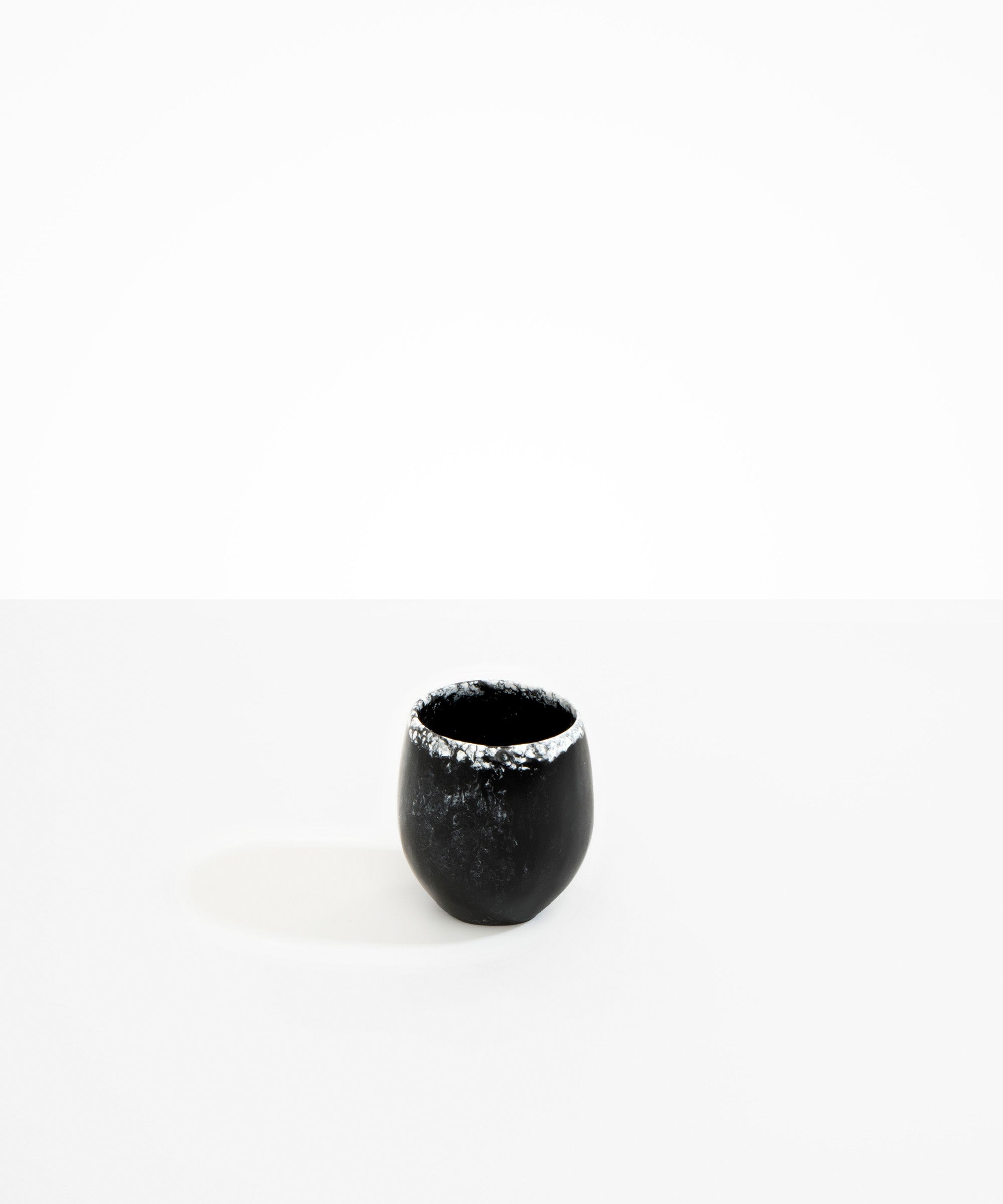 Dinosaur Designs Large Rock Cup in Black Marble — handcrafted marbled black and white resin cup with rounded bulbous form and open organic rim
