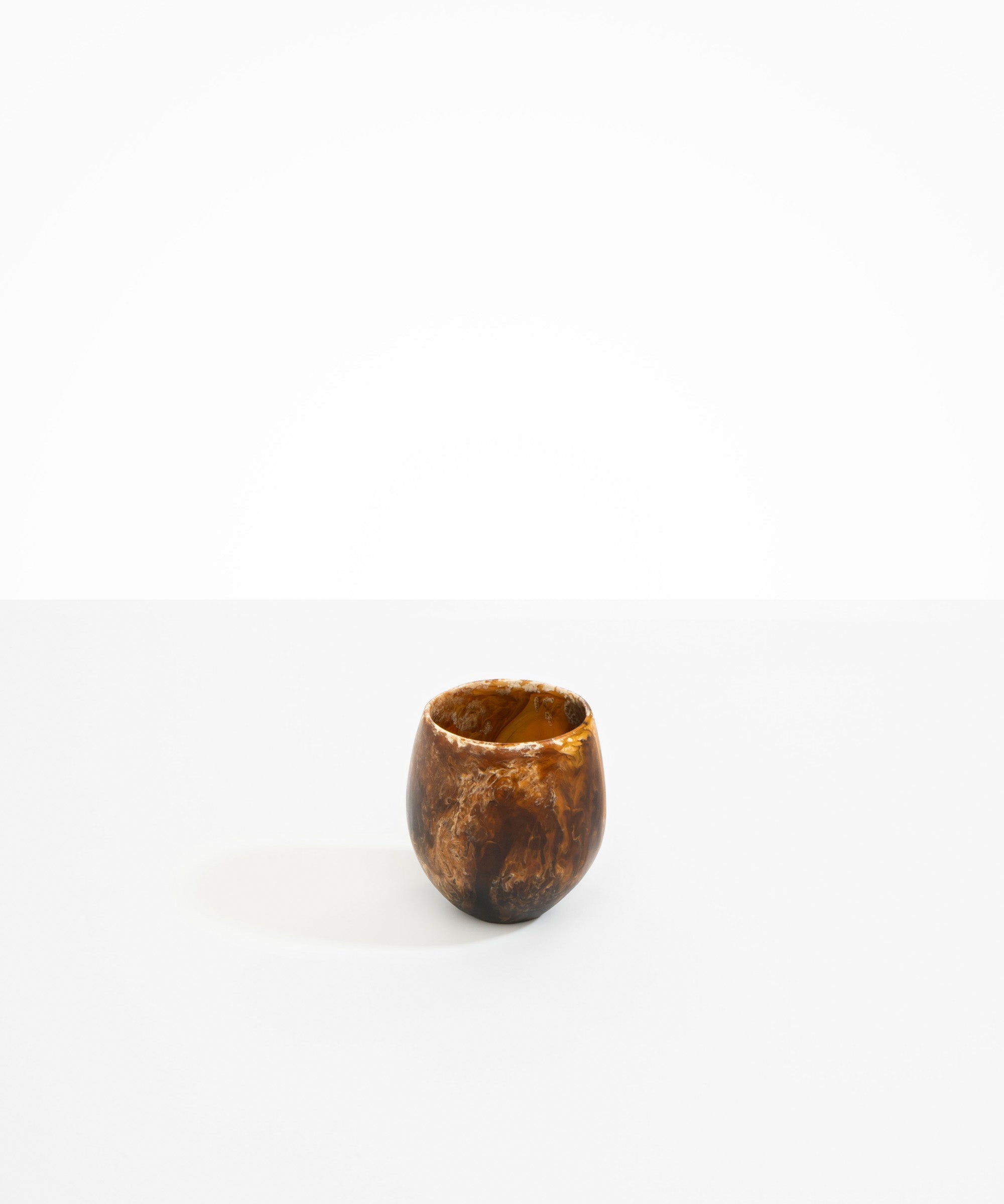 Dinosaur Designs Large Rock Cup in Dark Horn — handcrafted marbled brown, black and pearlescent gold resin cup with rounded bulbous form and open organic rim