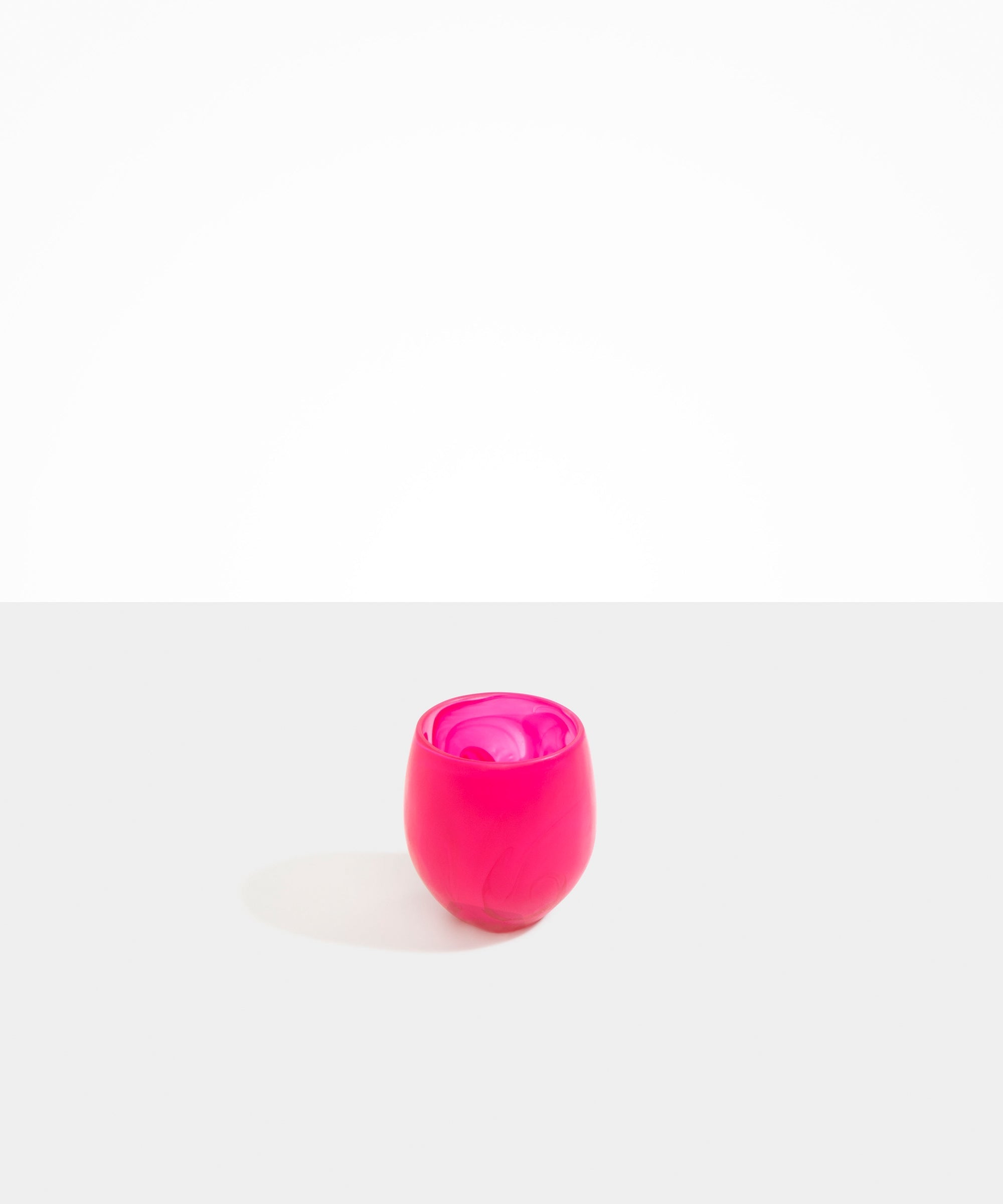 Dinosaur Designs Large Rock Cup in Flamingo — handcrafted marbled pink and transparent resin cup with rounded bulbous form and open organic rim