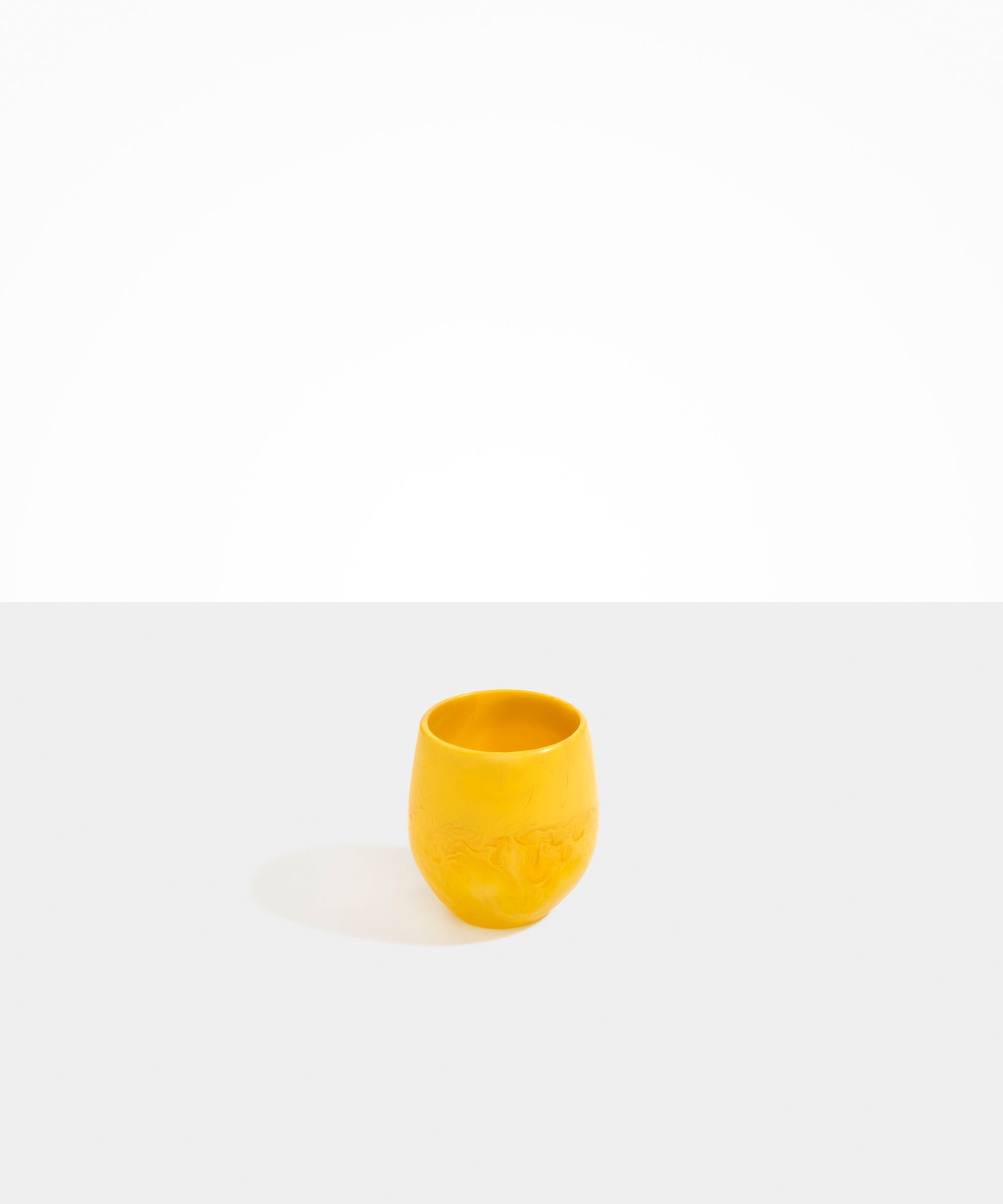 Dinosaur Designs Large Rock Cup in Honeycomb — handcrafted marbled yellow resin cup with rounded bulbous form and open organic rim