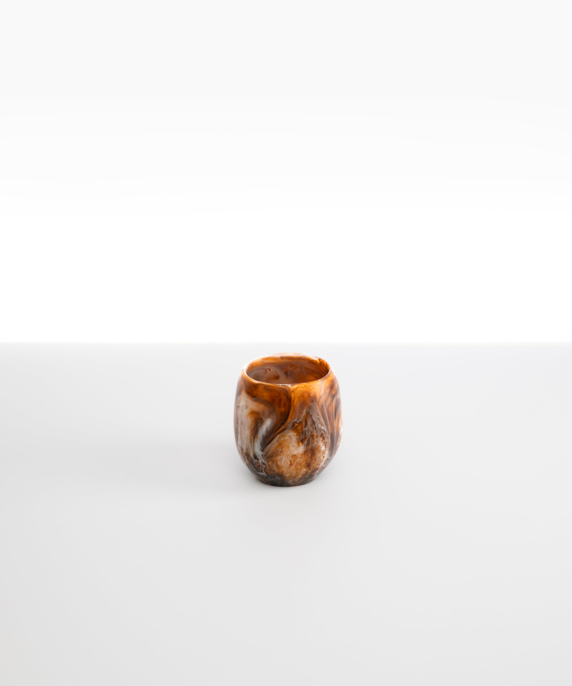 Dinosaur Designs Large Rock Cup in Light Horn — handcrafted marbled brown, cream and clear resin cup with rounded bulbous form and open organic rim