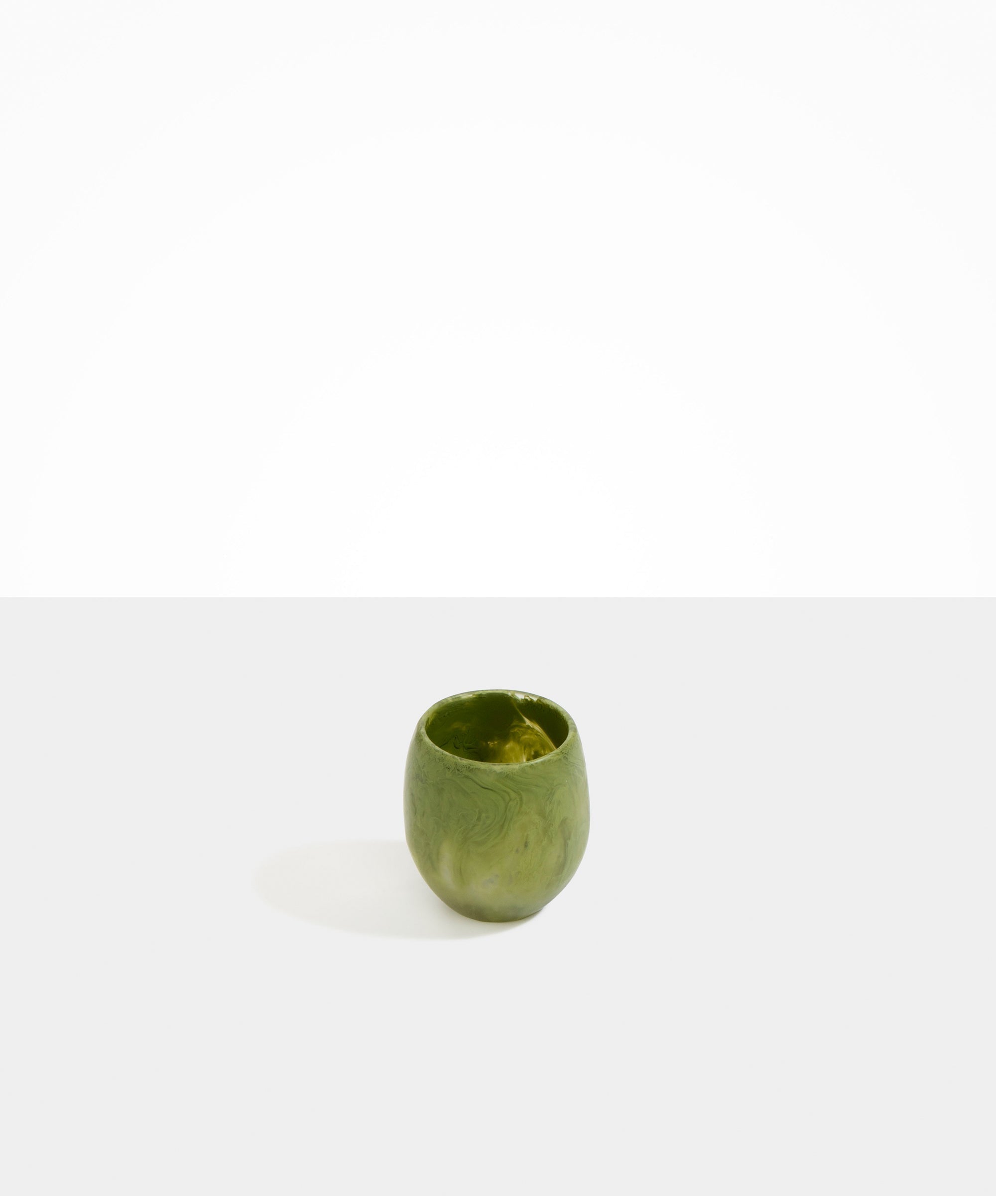 Dinosaur Designs Large Rock Cup in Olive — handcrafted marbled green and transparent resin cup with rounded bulbous form and open organic rim