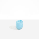 Dinosaur Designs Large Rock Cup in Pool — handcrafted marbled blue and transparent resin cup with rounded bulbous form and open organic rim..
