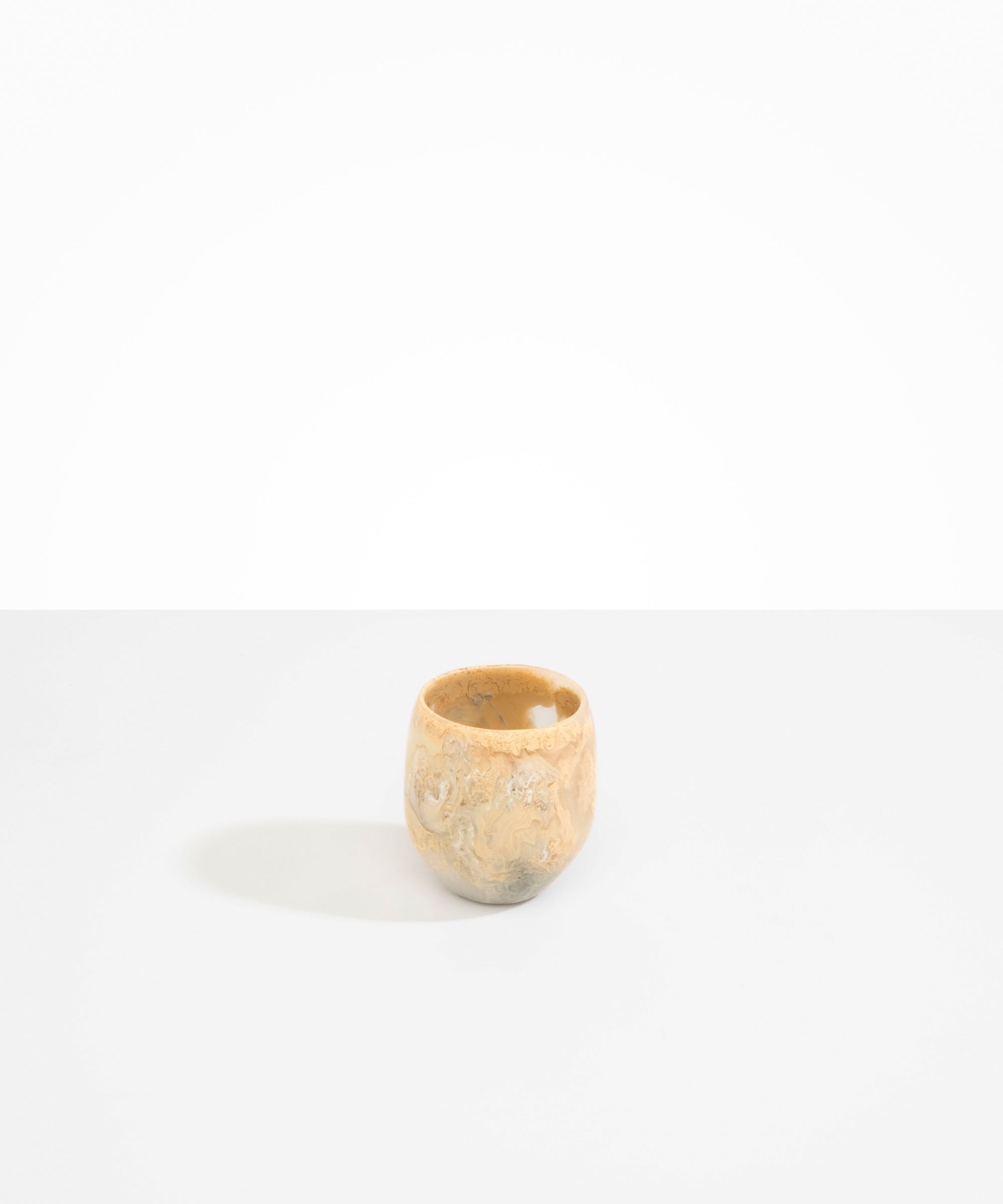 Dinosaur Designs Large Rock Cup in Sandy Pearl — handcrafted marbled beige, grey and pearlescent resin cup with rounded bulbous form and open organic rim
