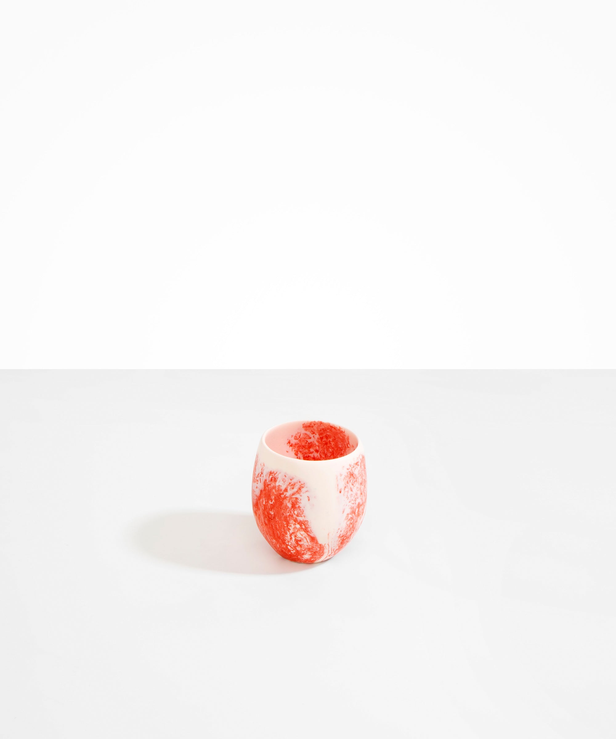 Dinosaur Designs Large Rock Cup in Strawberry — handcrafted marbled red and cream resin cup with rounded bulbous form and open organic rim
