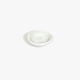 Dinosaur Designs Bones Dish in Cloud — small handcrafted grey and cream marbled resin trinket dish with organic form..
