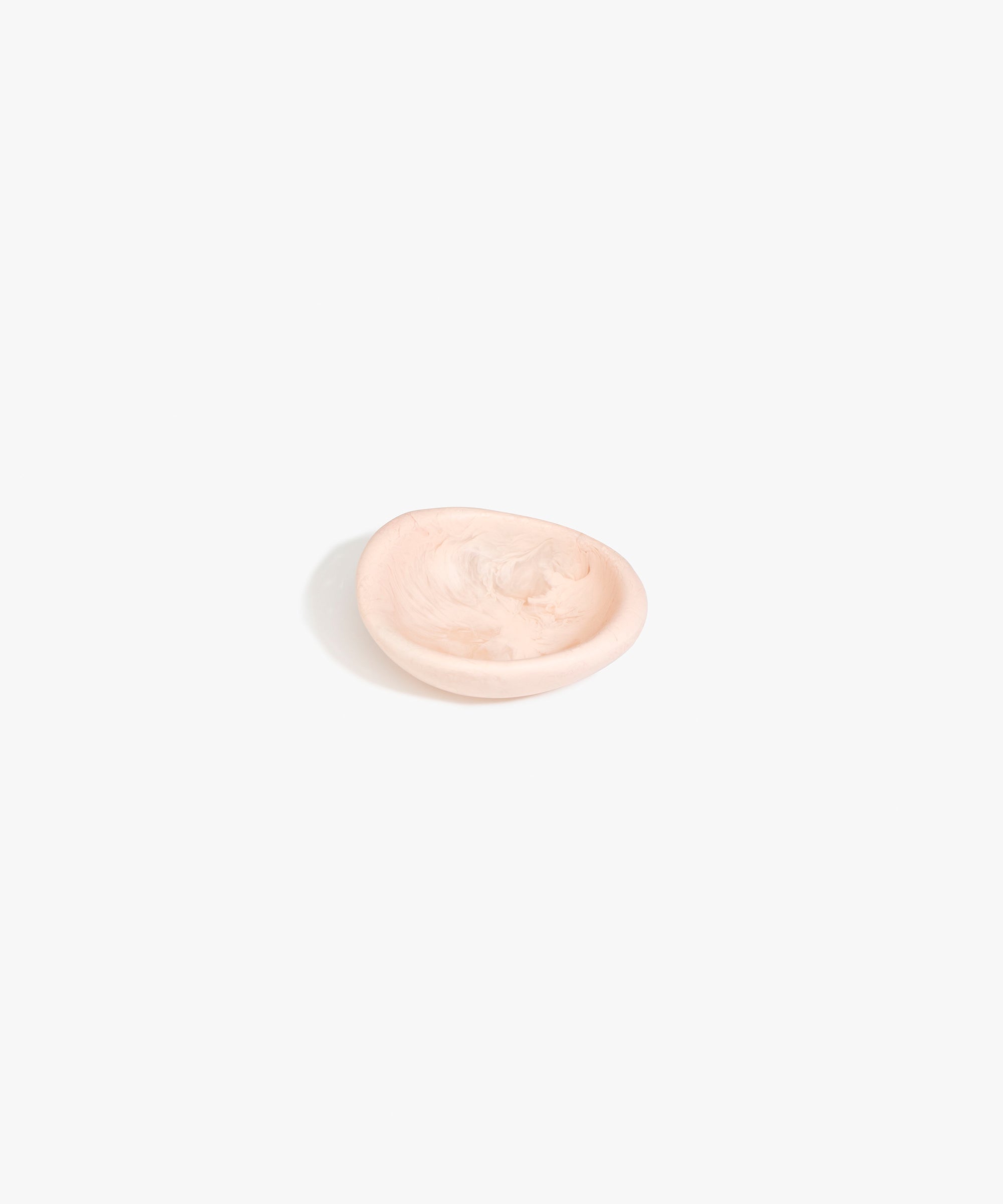 Dinosaur Designs Bones Dish in Rose Swirl — small handcrafted pink marbled resin trinket dish with organic form..