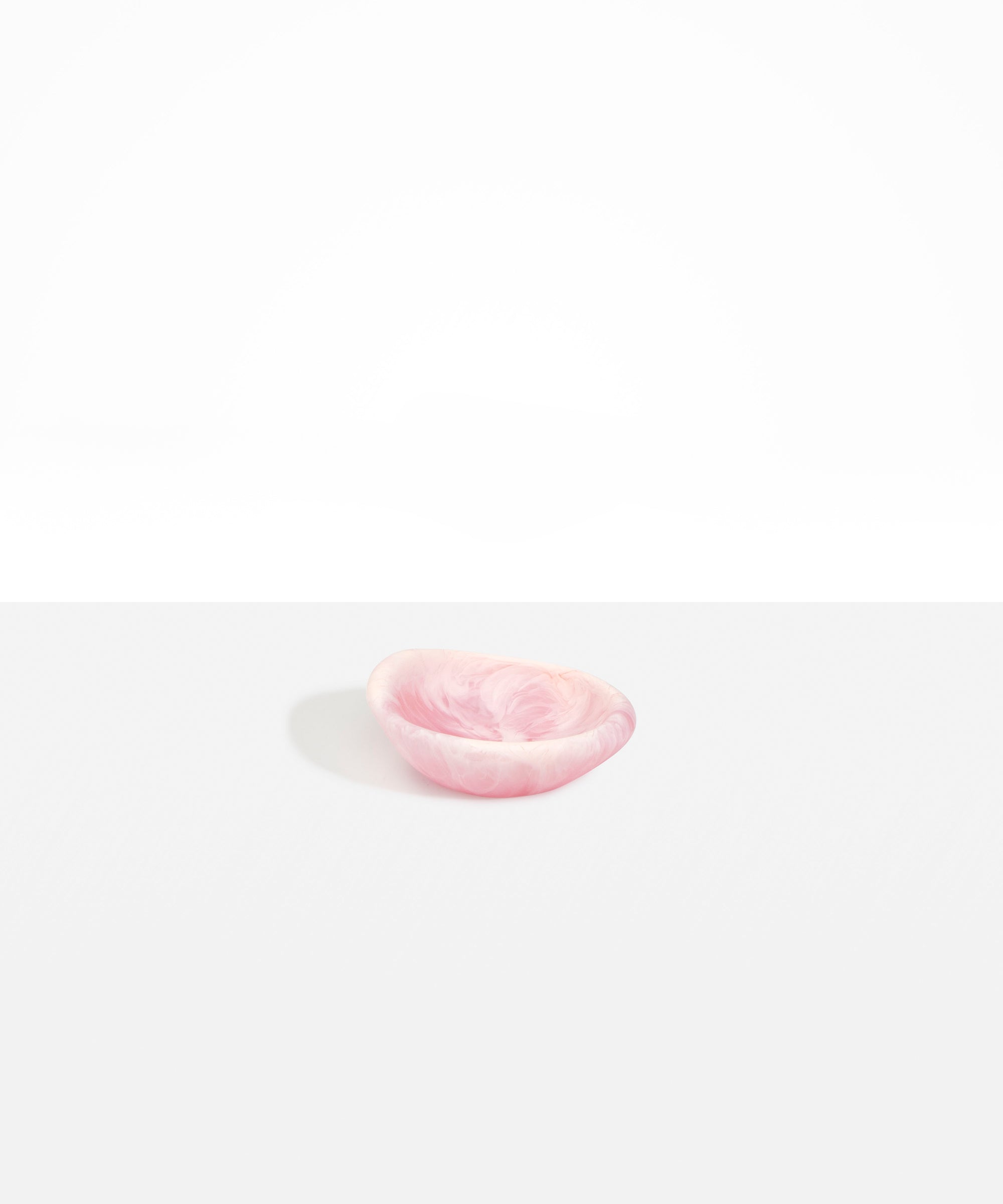 Dinosaur Designs Bones Dish in Shell Pink  — small handcrafted marbled pink resin trinket dish with organic form