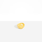 Dinosaur Designs Beetle Dish in Pollen — handcrafted marbled yellow resin miniature salt dish with rounded organic form