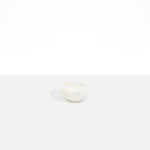 Dinosaur Designs Beetle Dish in Chalk Swirl — handcrafted marbled off-white resin miniature salt dish with rounded organic form