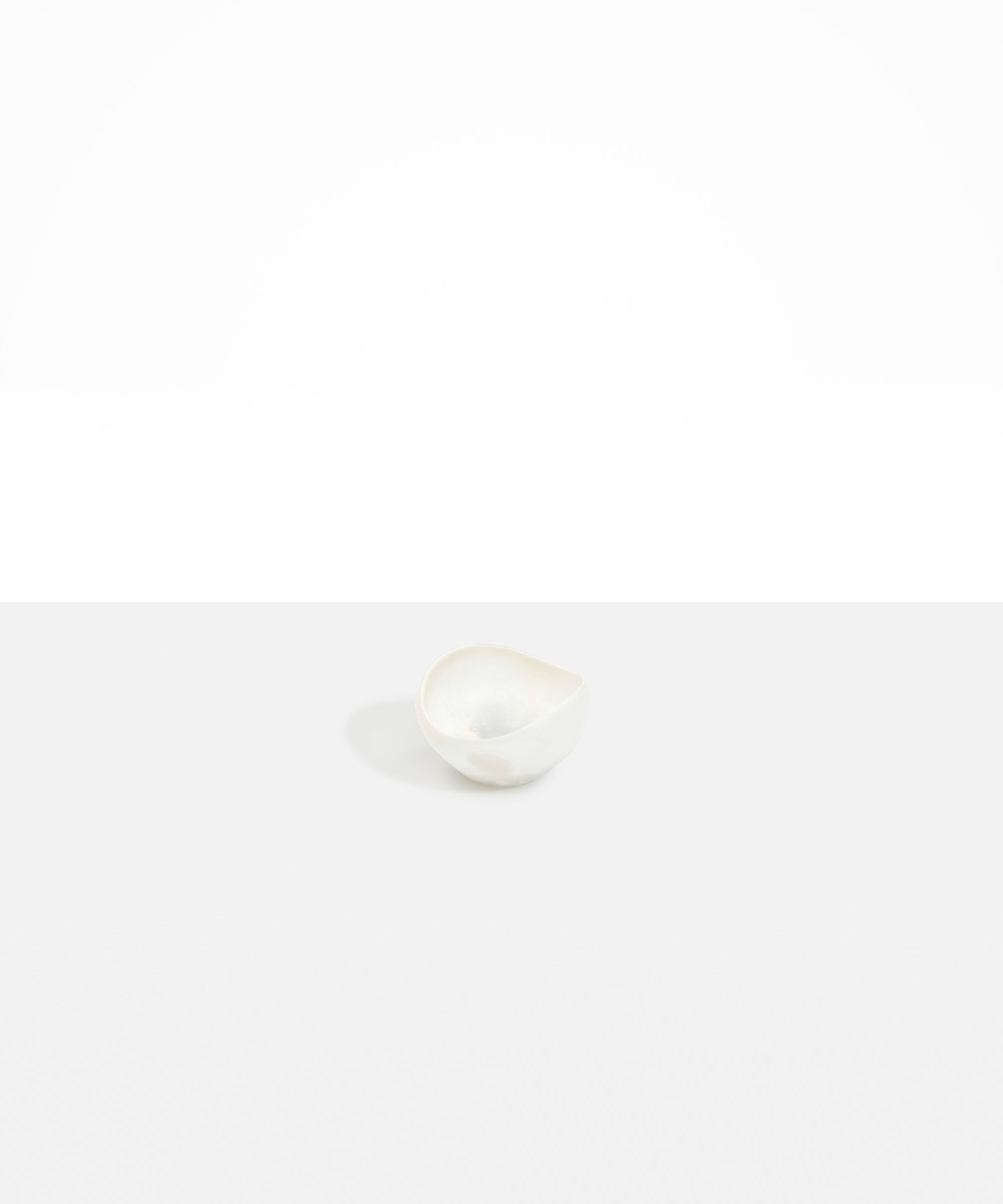 Dinosaur Designs Beetle Dish in Chalk Swirl — handcrafted marbled off-white resin miniature salt dish with rounded organic form