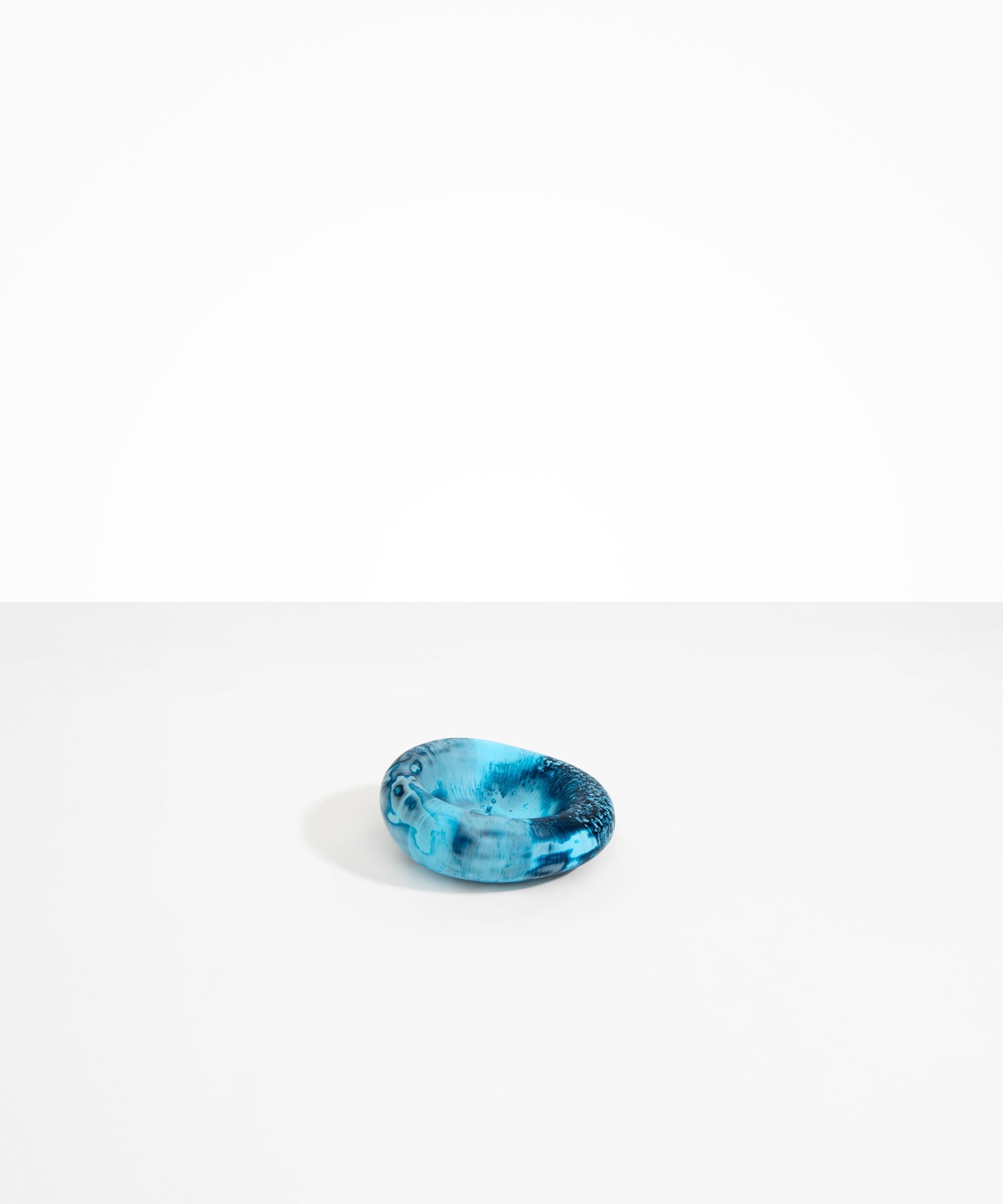 Dinosaur Designs Medium Drift Dish in Water— handcrafted marbled light and dark blue resin chunky trinket dish with organic form