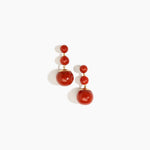 Dinosaur Designs Full Moon Drop Earrings in Lava with Brass — marbled terracotta red resin graduating bead drop earrings with brass fittings...
