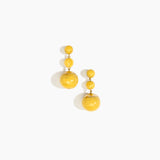 Dinosaur Designs Full Moon Drop Earrings in Pollen with Brass — marbled warm yellow resin graduating bead drop earrings with brass fittings..
